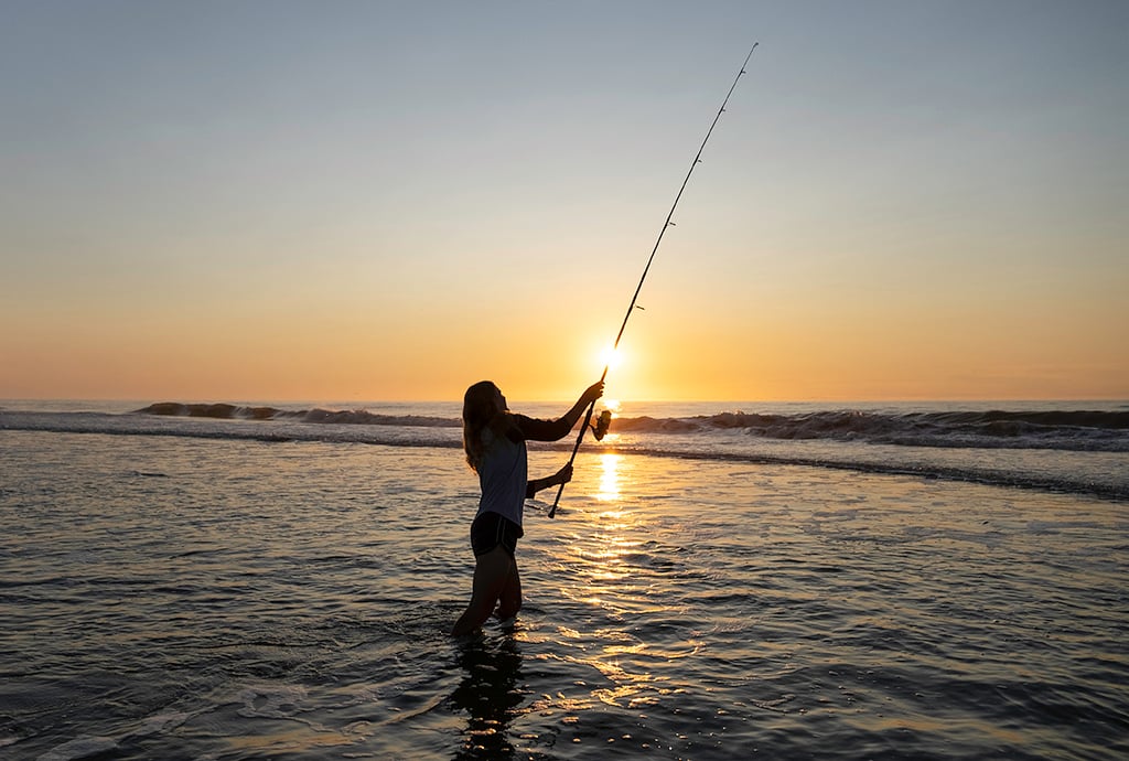 Surf fishing at sunrise, Assateague Island National Seashore / NPS - Lisa Giris