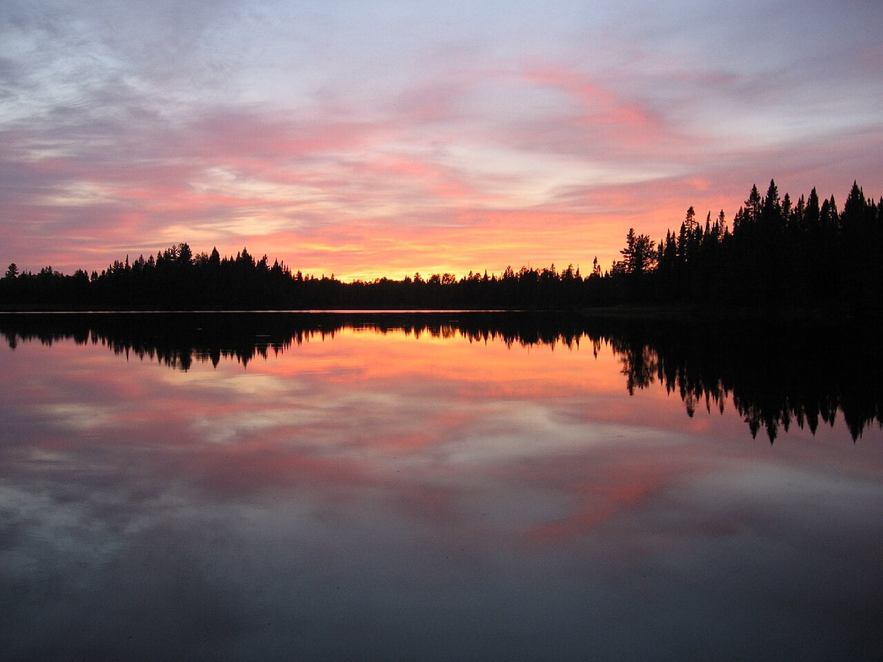 Pose Lake in the Boundary Waters Canoe Area Wilderness. Sunset over Pose Lake, a small lake accessible only by foot.