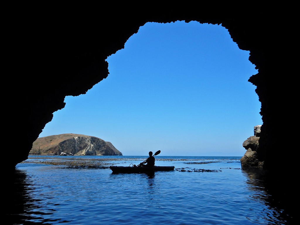 Exploring a sea cave at Santa Cruz Island, Channel Islands National Park / Hidekatsu Kajitani via NPS
