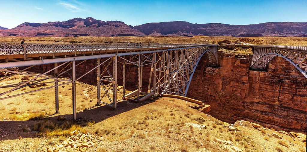 You can walk across the Historic Navajo Bridge (on the left), Glen Canyon National Recreation Area / Rebecca Latson
