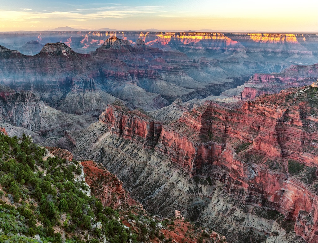 A summer sunrise over the North Rim of the Grand Canyon/Rebecca Latson file