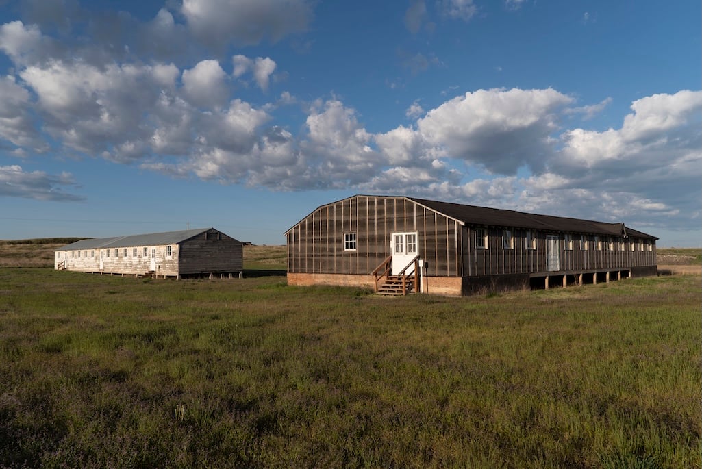 Buildings that housed barracks and a mess hall stand at Minidoka National Historic Site/NPS file