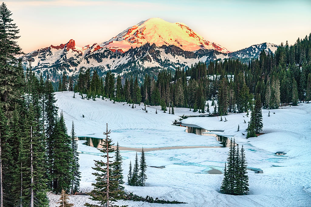There's still plenty of snow in June covering Tipsoo Lake, Mount Rainier National Park / Rebecca Latson