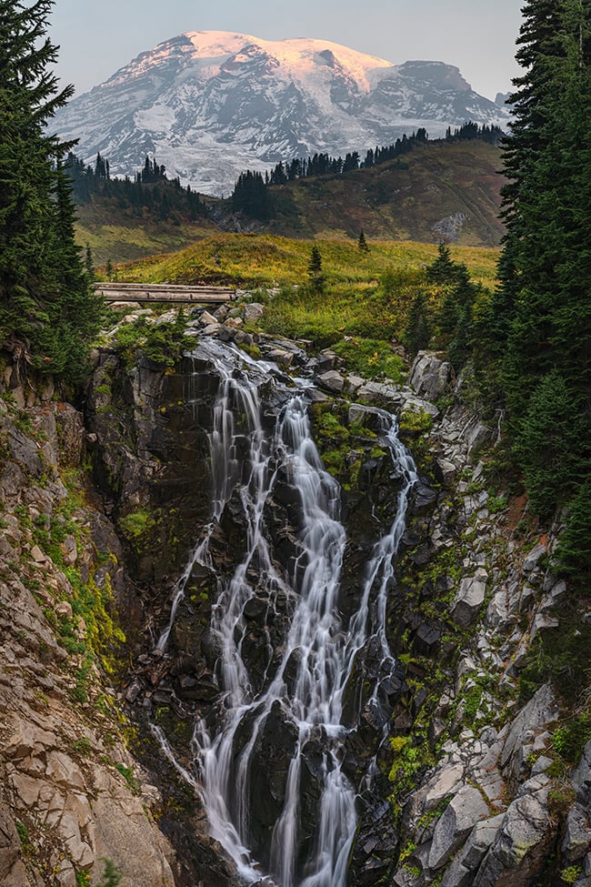 A hazy sunrise over Myrtle Falls, Mount Rainier National Park / Rebecca Latson