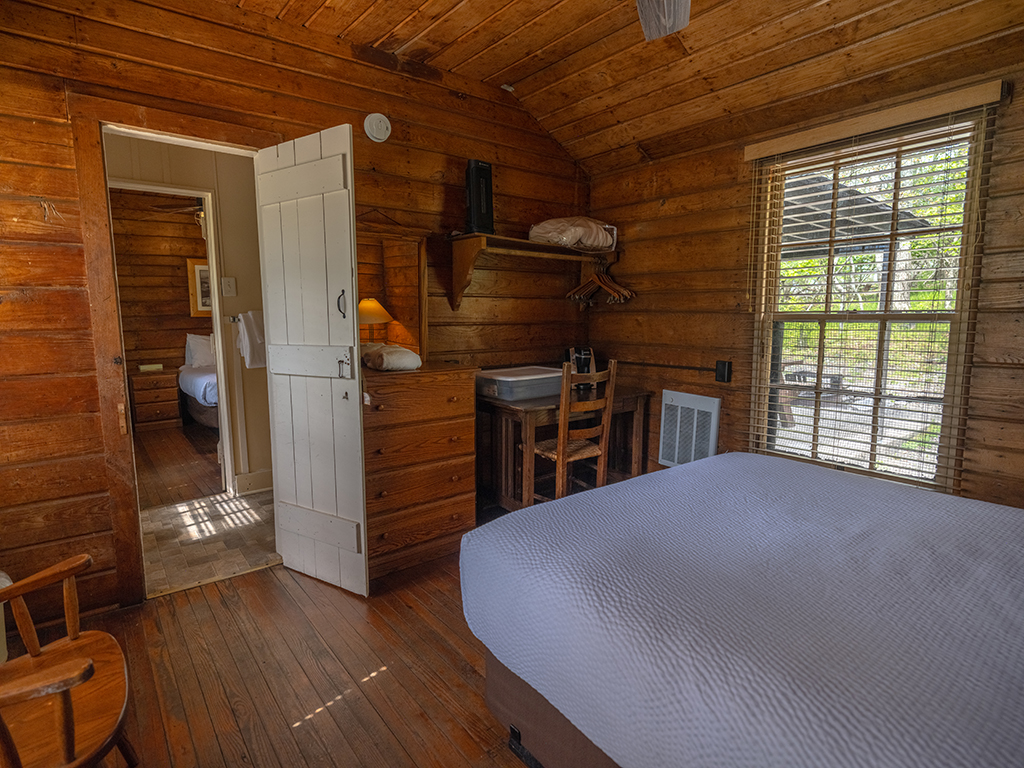 The other room of a Lewis Mountain cabin with shared bathroom, Shenandoah National Park / Rebecca Latson