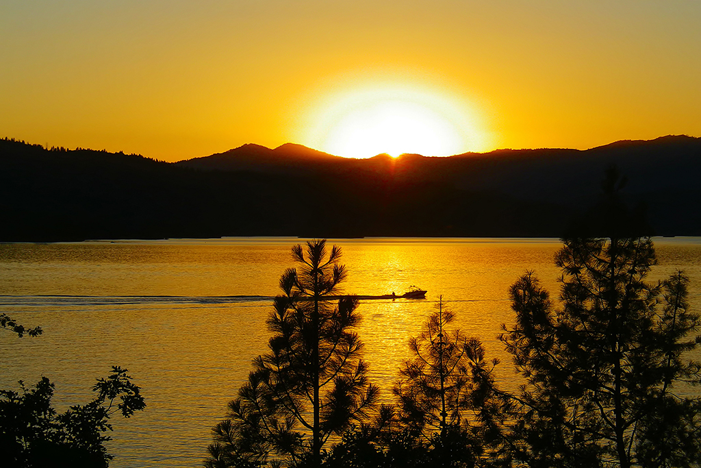 Waterskiing at sunset, Whiskeytown National Recreation Area / NPS file