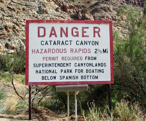 CANY-WarningSign-cataract-c.jpg Sign in Canyonlands National Park.