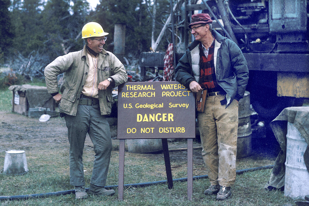 Bob Fournier (left) and Don White (right) at the Y3 drilling site in Pocket Basin adjacent to Ojo Caliente, Lower Geyser Basin, Yellowstone National Park, in 1967 / USGS Photo