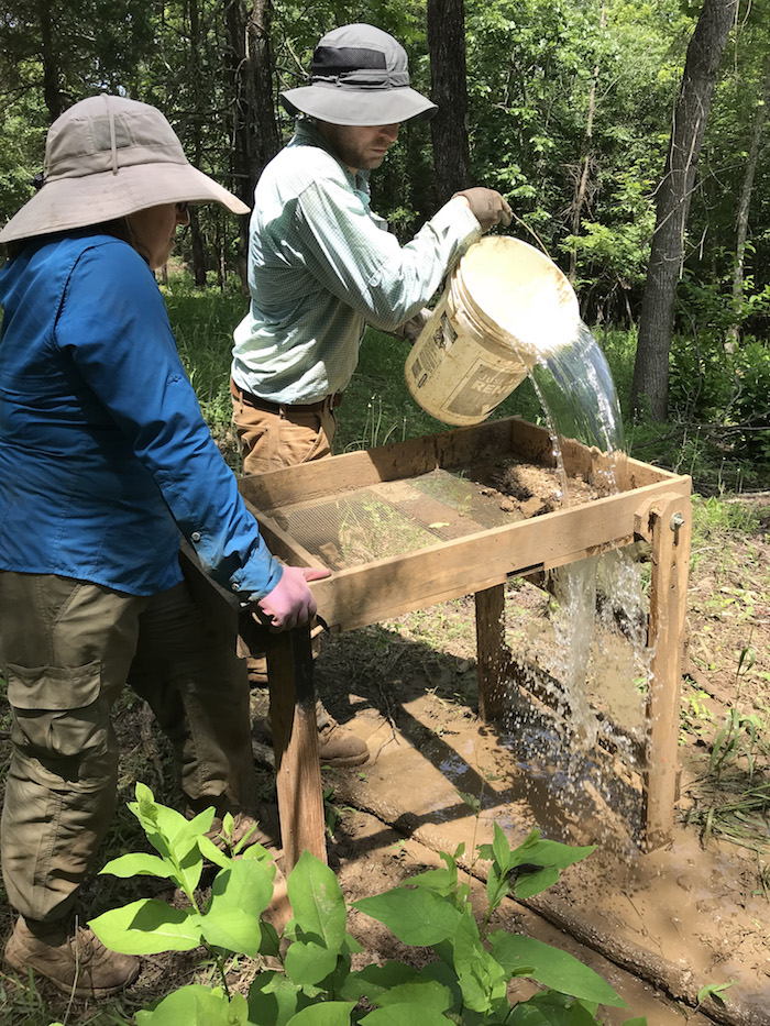 Project lead, Dr. Kevin Fogle, and Field Director, Dr. Kelly Goldberg, employ water screening techniques to find artifacts in the waterlogged clay soils/NPS Project lead, Dr. Kevin Fogle, and Field Director, Dr. Kelly Goldberg, employ water screening techniques to find artifacts in the waterlogged clay soils/NPS