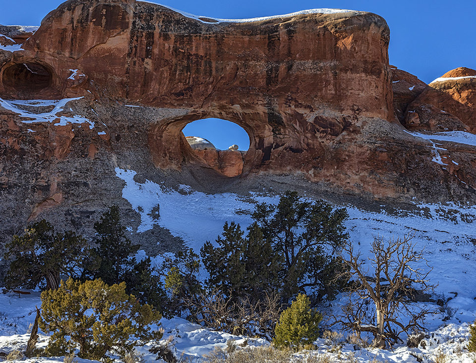A look through Tunnel Arch, Arches National Park / Rebecca Latson A look through Tunnel Arch, Arches National Park / Rebecca Latson