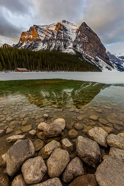 Sunrise Over Mt. Temple And Lake Louise, Banff National Park / Rebecca Latson Sunrise Over Mt. Temple And Lake Louise, Banff National Park / Rebecca Latson