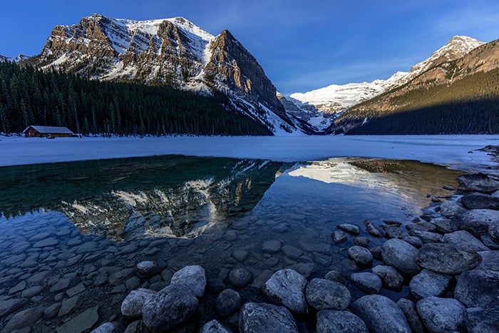 Sunrise Reflections At Lake Louise, Banff National Park / Rebecca Latson Sunrise Reflections At Lake Louise, Banff National Park / Rebecca Latson