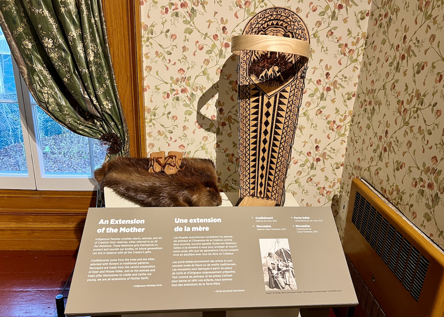 In the nursery, a wooden cradleboard, baby moccasins and a beaver pelt speak to the way that Indigenous Peoples consider plants, animals and "All of Creation" to be relatives. In the nursery, a wooden cradleboard, baby moccasins and a beaver pelt speak to the way that Indigenous Peoples consider plants, animals and "All of Creation" to be relatives.