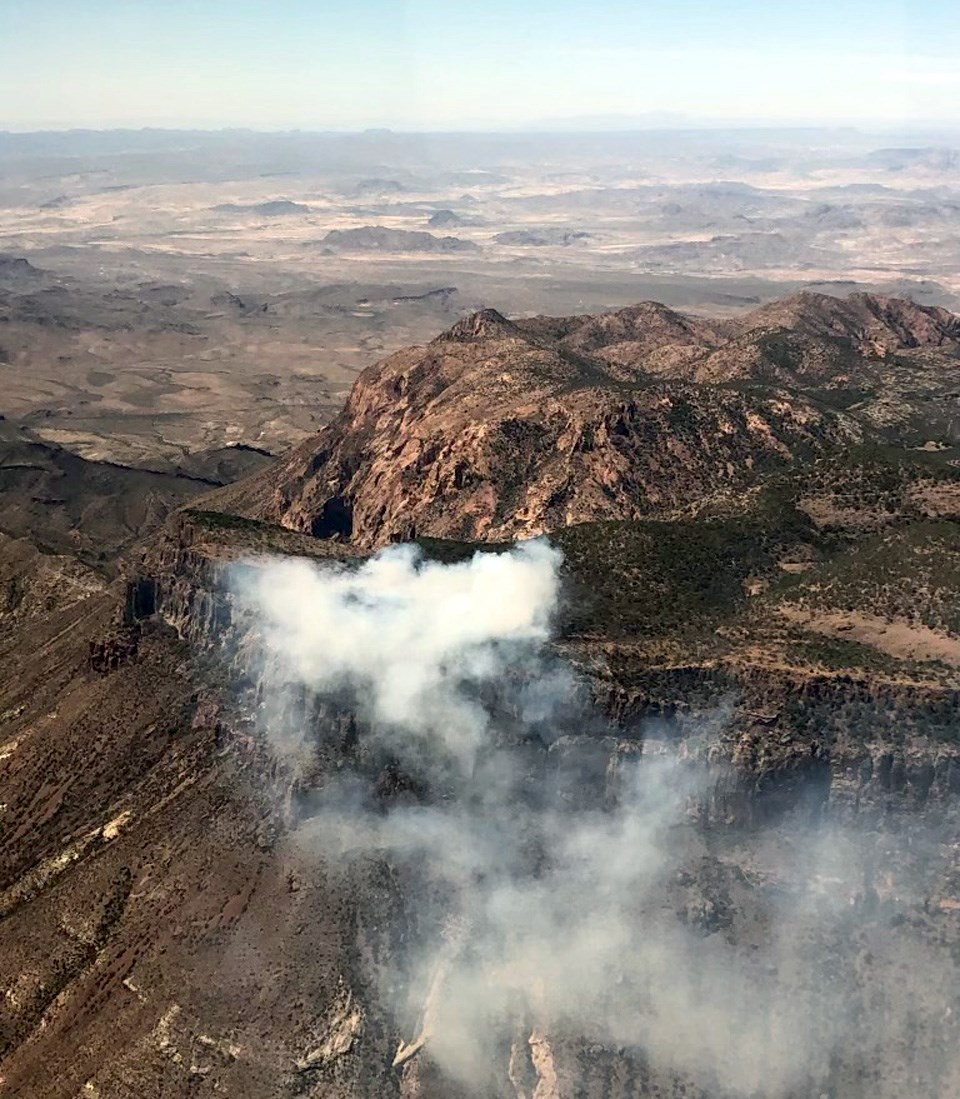 A wildfire was burning in a remote section of the Chisos Mountains in Big Bend National Park/TX Forest Service Air Attack