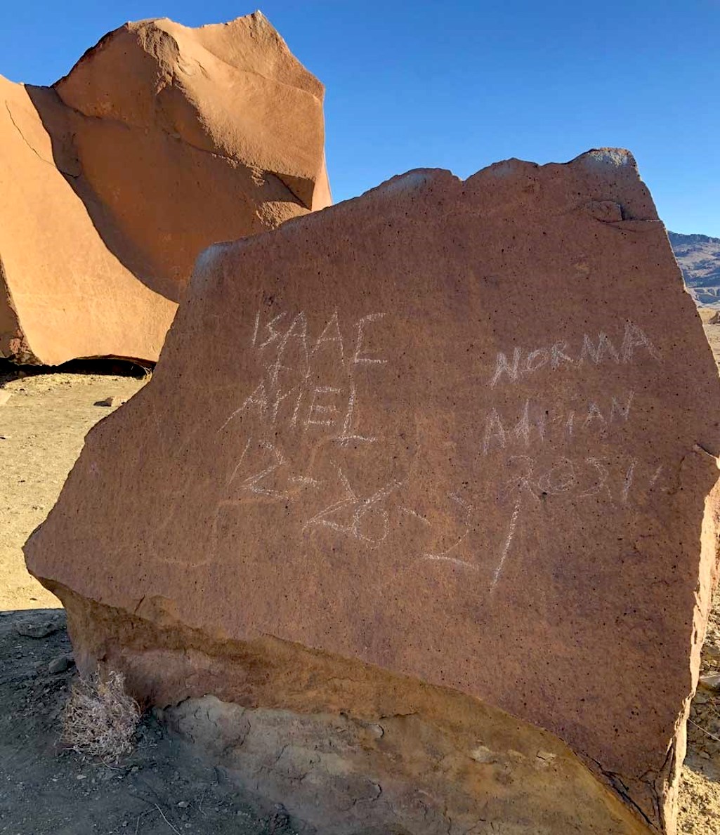Vandals scratched their names across a rock art panel at Big Bend National Park/NPS Vandals scratched their names across a rock art panel at Big Bend National Park/NPS
