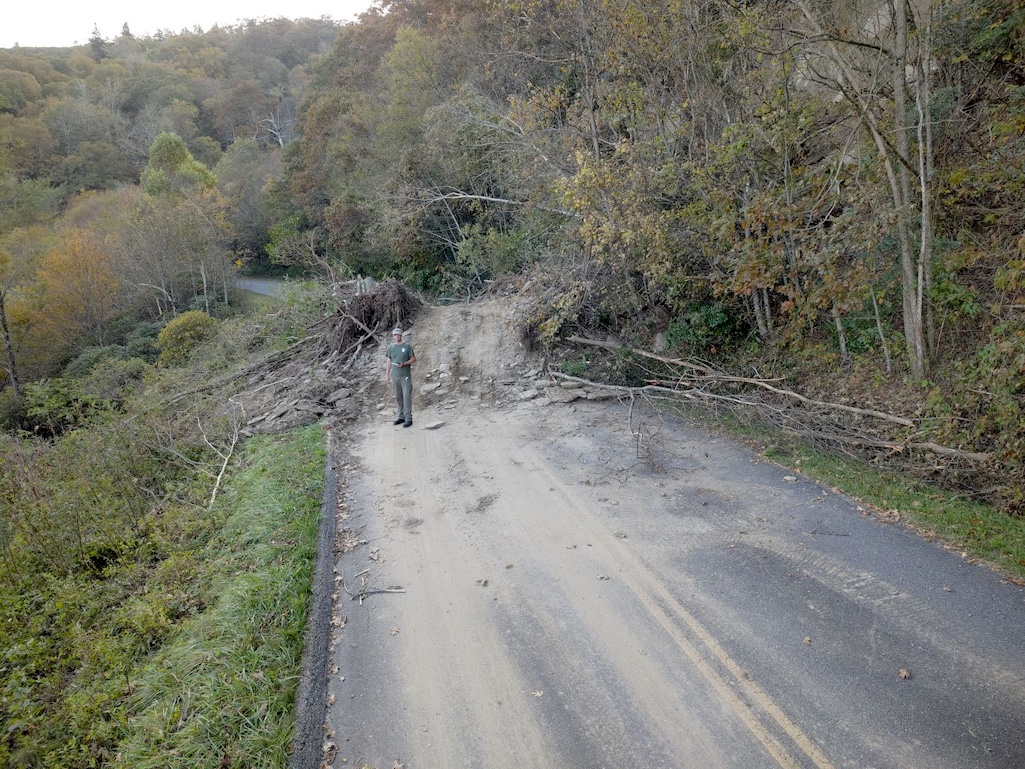 A landslide at milepost 348 covers the parkway/NPS