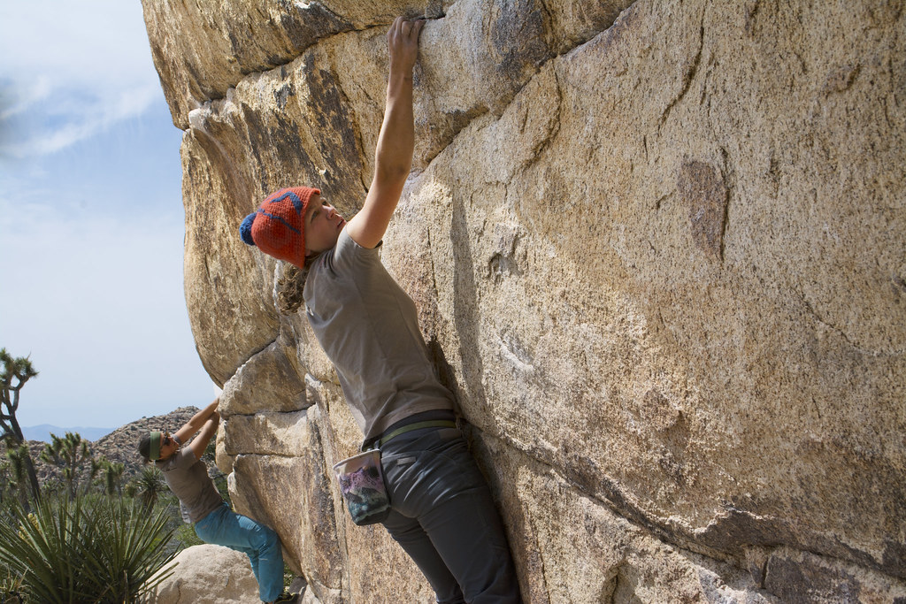 A woman boulders at Joshua Tree National Park.