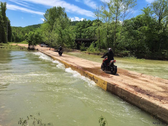 Motorcyclists ride across the Ponca low-water bridge/Marysia Jastrzebski