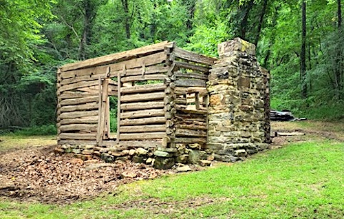 An after photo of Beaver Jim Villines’ Boyhood Home with the roof and lean-to sections removed/NPS 