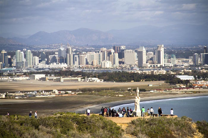 Cabrillo National Monument and San Diego skyline/George Oxford Miller