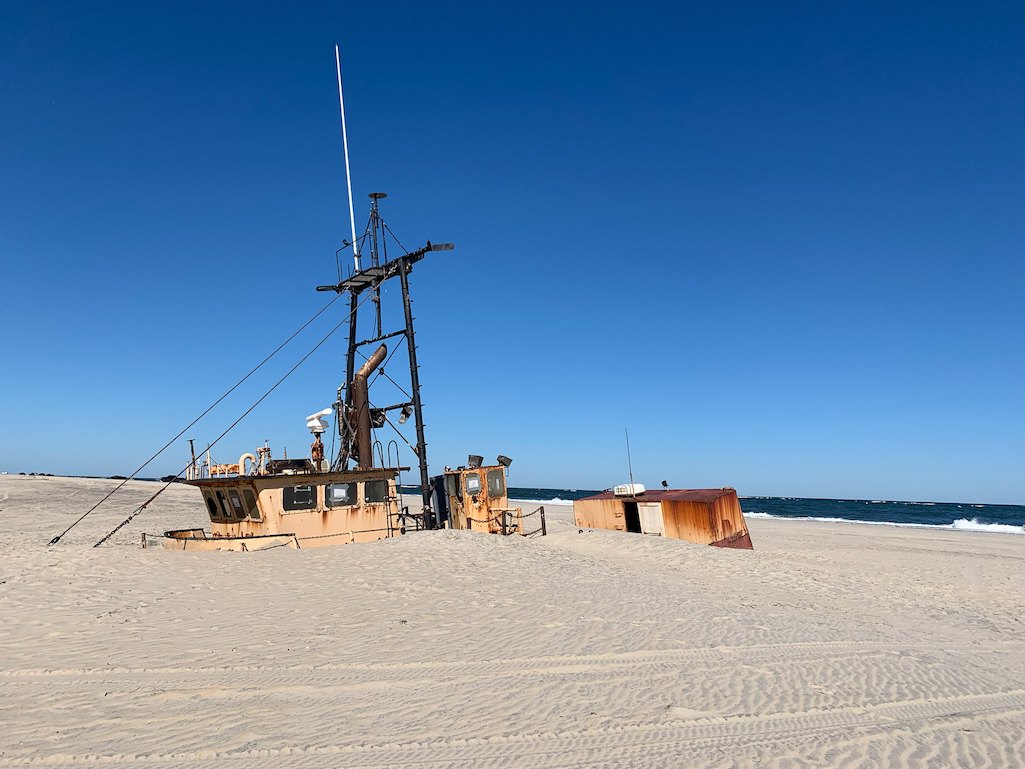 A North Carolina company has been hired to remove an abandoned scallop boat from a Cape Hatteras National Seashore beach/NPS 