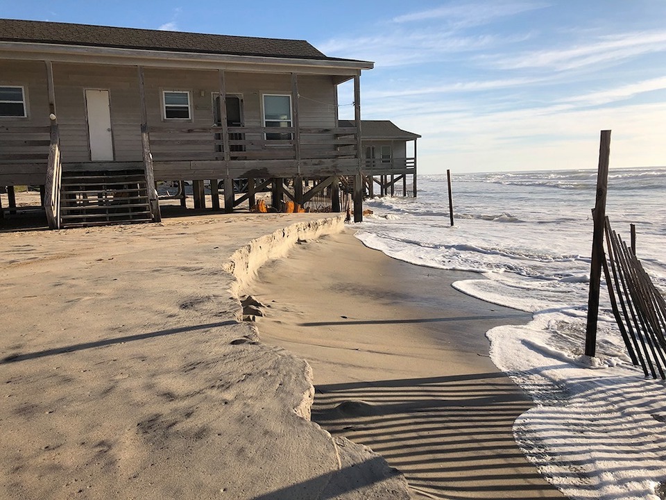 The Long Point cabins at Cape Lookout National Seashore are in danger of being destroyed by the surf if not moved/NPS file