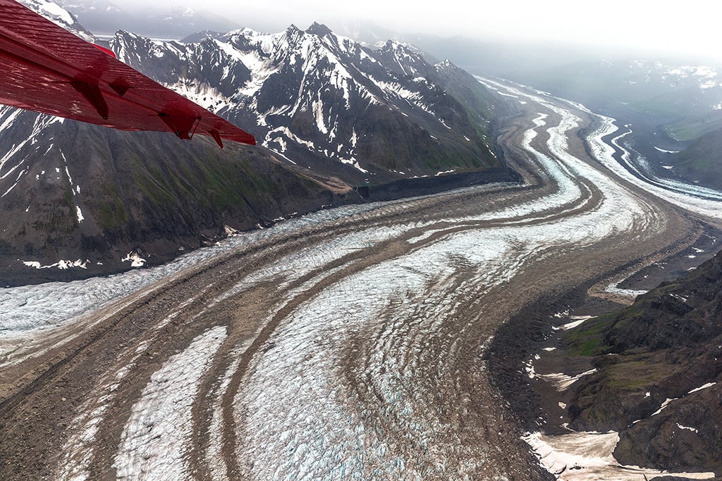 Glaciers are literally "rivers of ice" and can carry debris many miles from their origin, Denali National Park and Preserve / Rebecca Latson Glaciers are literally "rivers of ice" and can carry debris many miles from their origin, Denali National Park and Preserve / Rebecca Latson