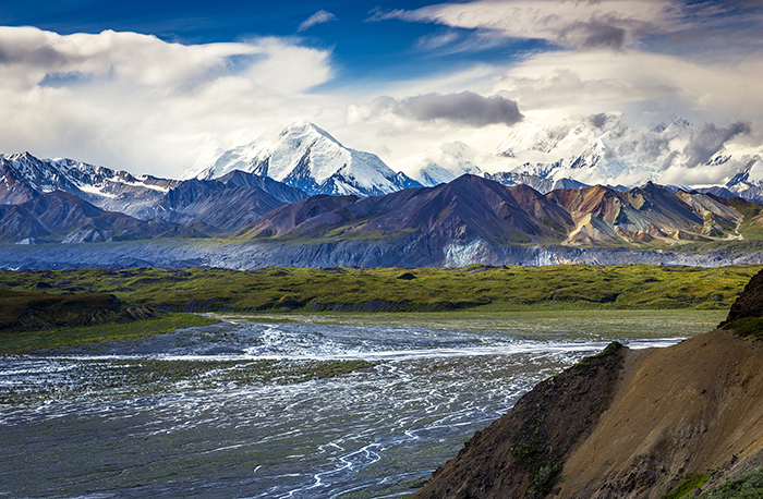 Sun and clouds in the mountains, Denali National Park / Rebecca Latson Sun and clouds in the mountains, Denali National Park / Rebecca Latson