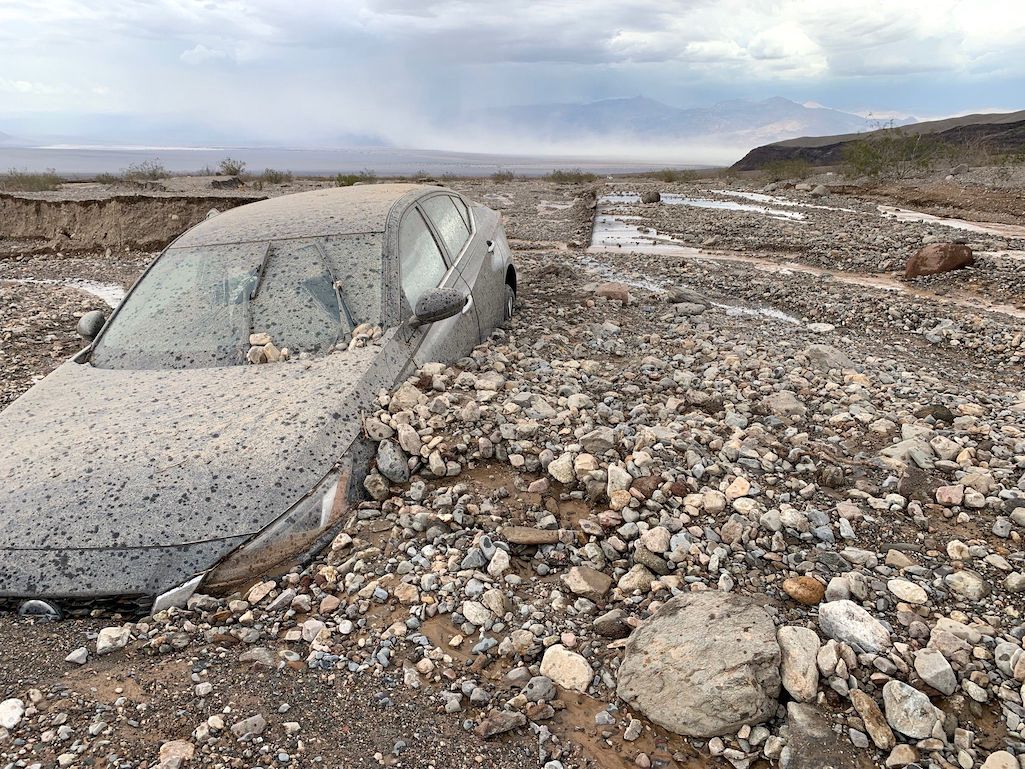 Flash flooding washed this car off Highway 190 in Death Valley National Park/NPS Flash flooding washed this car off Highway 190 in Death Valley National Park/NPS