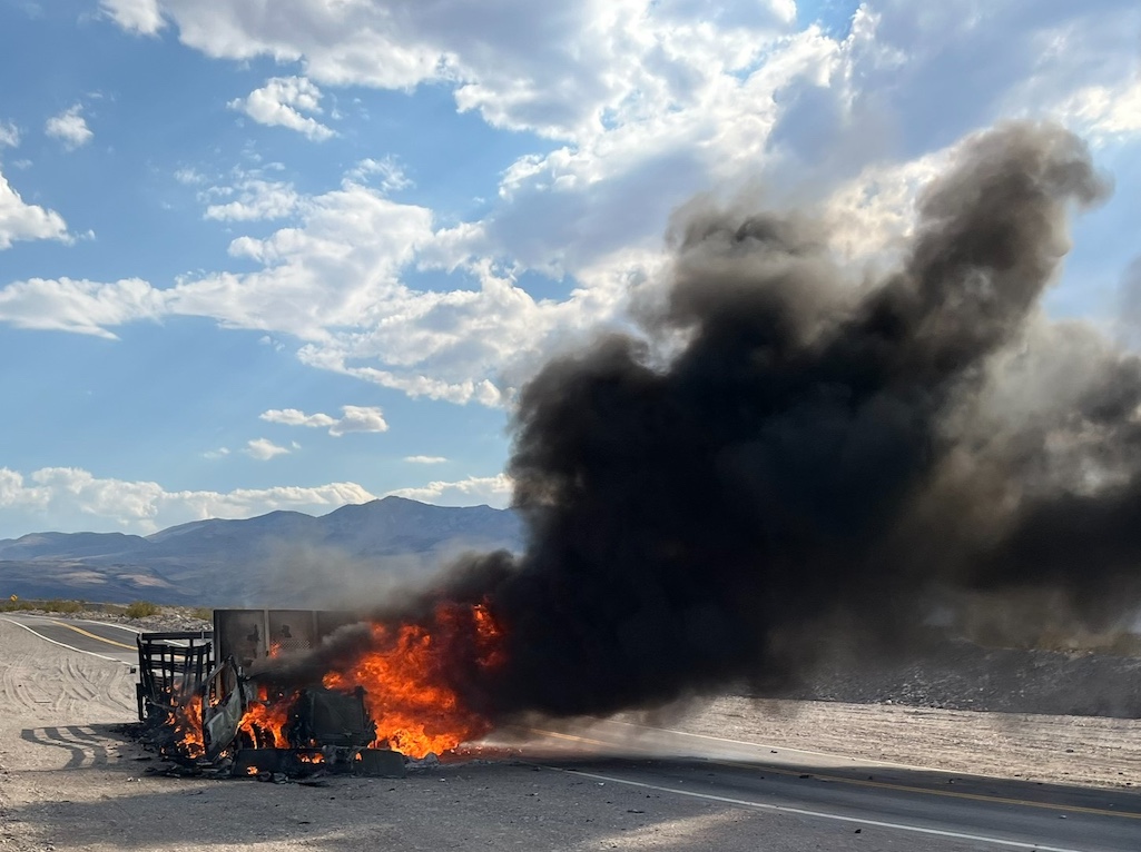 A semi truck descending into Death Valley on California 190 caught fire and was destroyed/NPS
