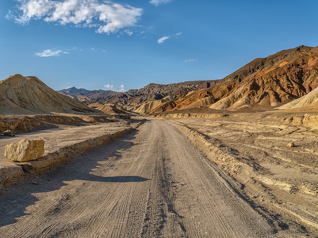 The road through Twenty Mule Team Canyon, Death Valley National Park / Rebecca Latson The road through Twenty Mule Team Canyon, Death Valley National Park / Rebecca Latson