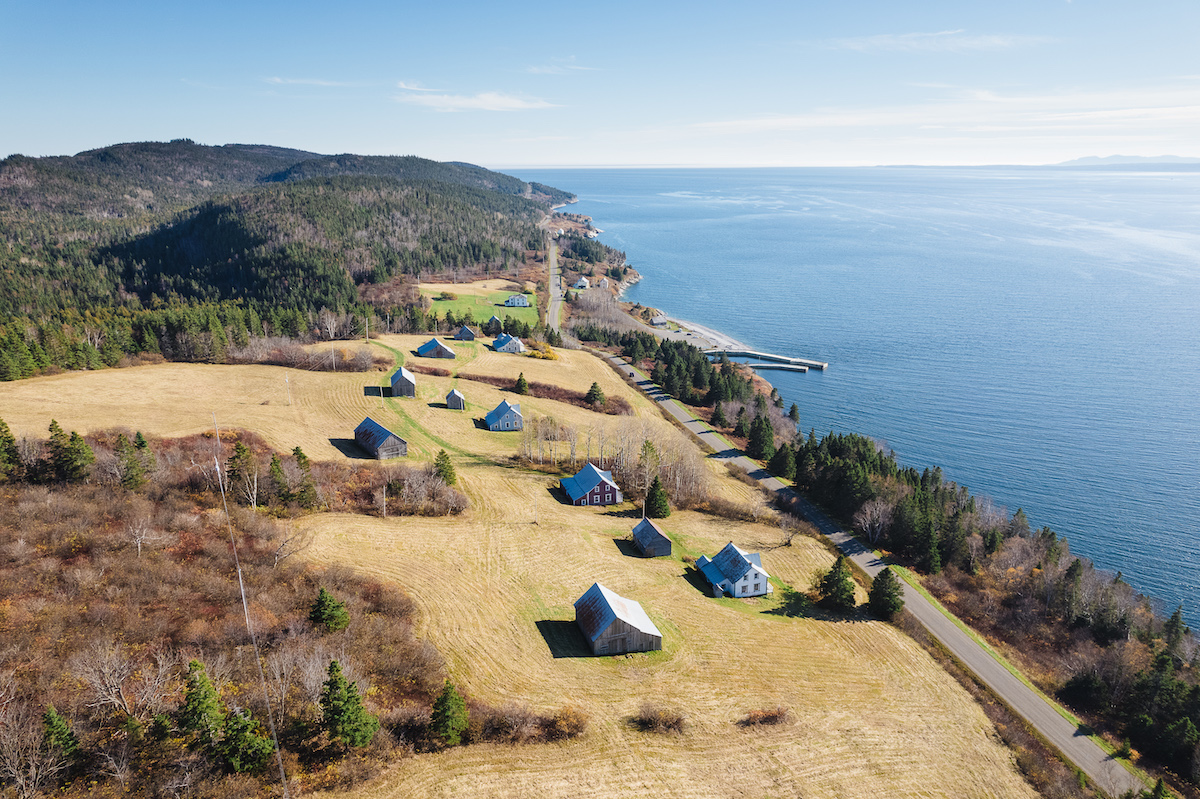An aerial view of the Grande-Grave Heritage Sector of Forillon National Park in Quebec. An aerial view of the Grande-Grave Heritage Sector of Forillon National Park in Quebec.