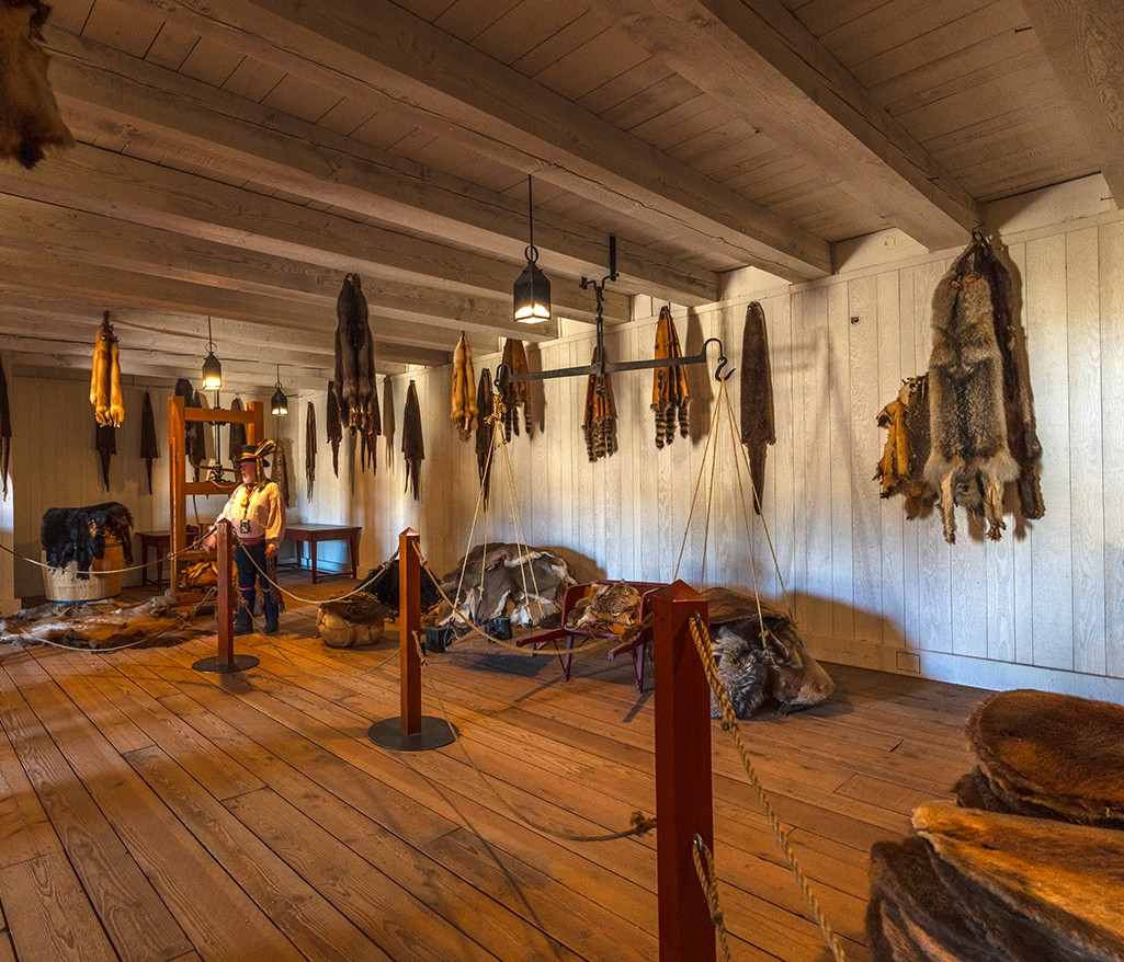 Volunteer Reggie Coates inside the fur store, Fort Vancouver National Historic Site / Rebecca Latson Volunteer Reggie Coates inside the fur store, Fort Vancouver National Historic Site / Rebecca Latson