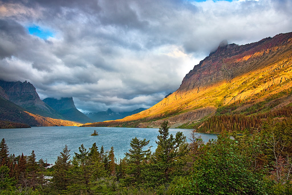 A swath of sunlight over the mountain at Wild Goose Island Overlook, ISO 100, f/5.6, 1/30 second, Glacier National Park / Rebecca Latson A swath of sunlight over the mountain at Wild Goose Island Overlook, ISO 100, f/5.6, 1/30 second, Glacier National Park / Rebecca Latson