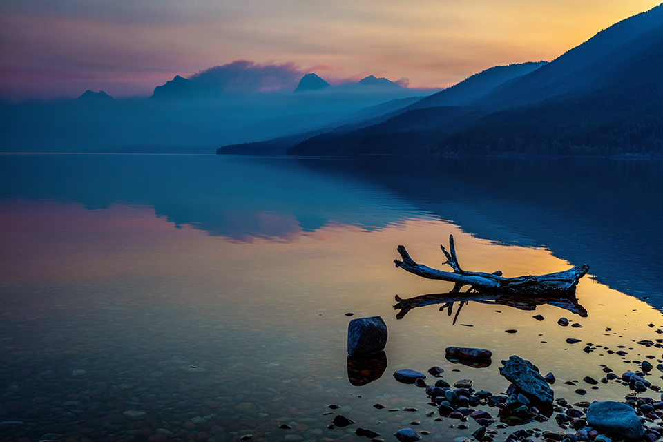 A quiet, hazy morning at Lake McDonald, Glacier National Park / Rebecca Latson A quiet, hazy morning at Lake McDonald, Glacier National Park / Rebecca Latson
