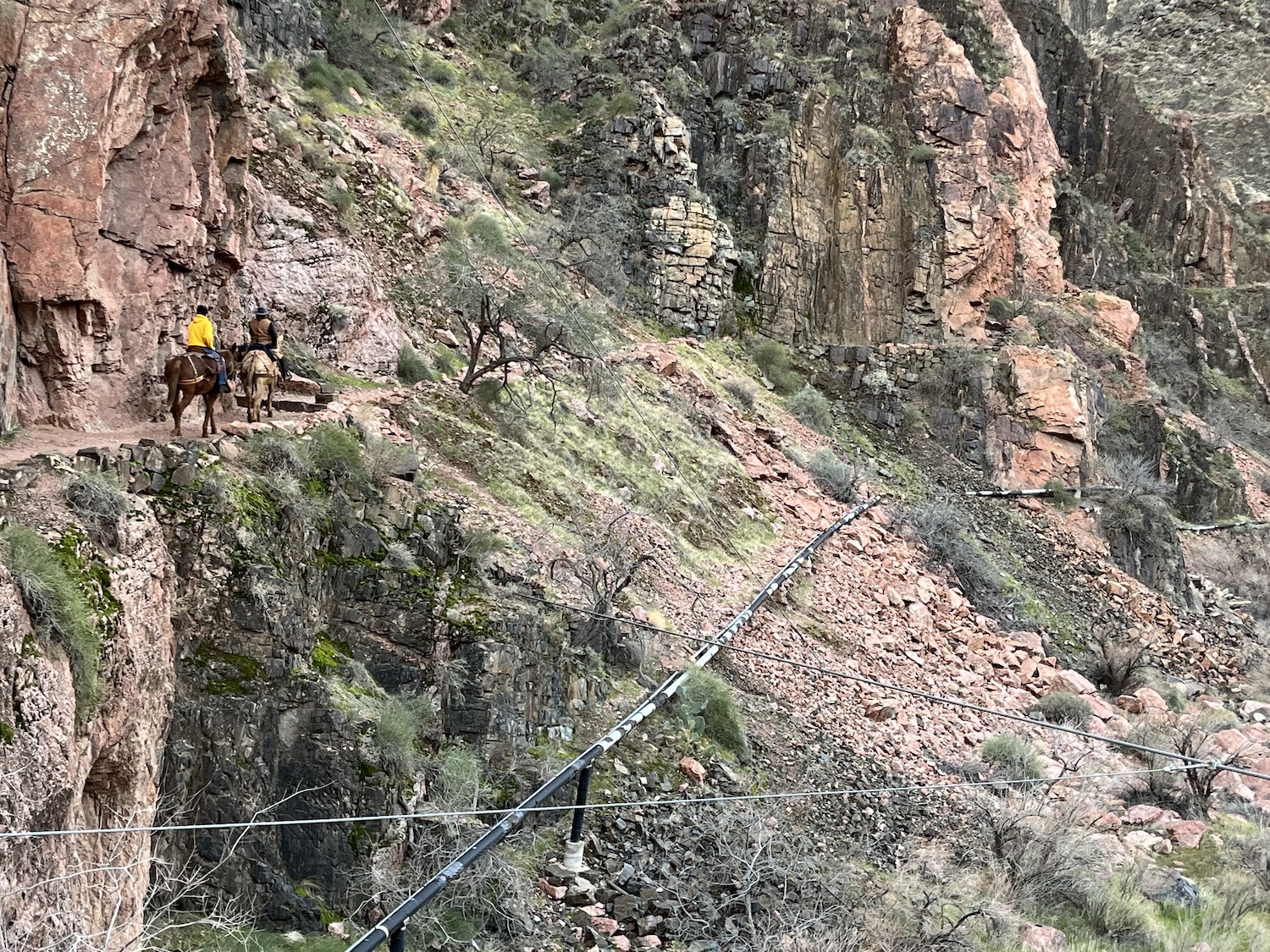 In many places, like here along the Bright Angel Trail, the pipeline is fully exposed to rockslides and flash floods/Lori Sonken