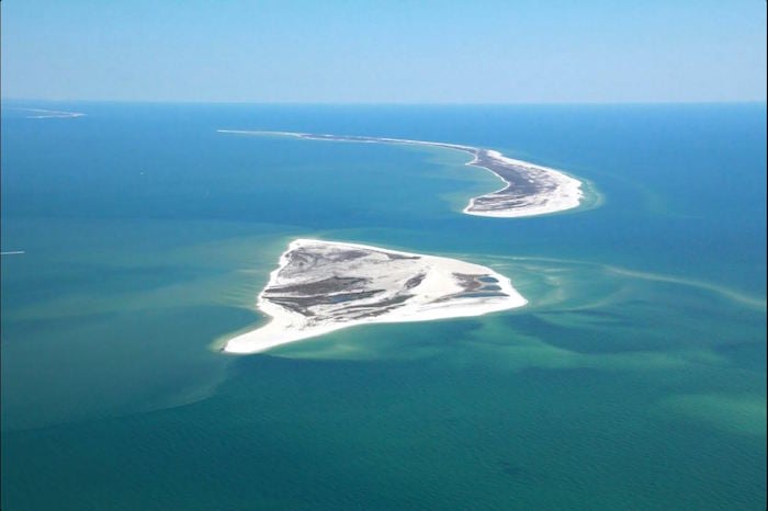West Petit Bois Island in the foreground and Petit Bois Island in the background. Courtesy of Fly The Coas