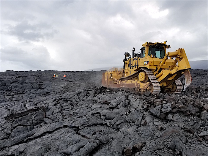 A bulldozer prepares Chain of Craters-Kalapana Road as an emergency evacuation route for the community/NPS, Mike Theune A bulldozer prepares Chain of Craters-Kalapana Road as an emergency evacuation route for the community/NPS, Mike Theune