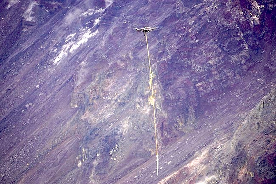 An unmanned aircraft system, UAS, flown to gather photographs, gas measurements and a water sample from the scalding hot surface of the pond in Halemaʻumaʻu crater on October 26th, 2019/NPS, A. LaValle