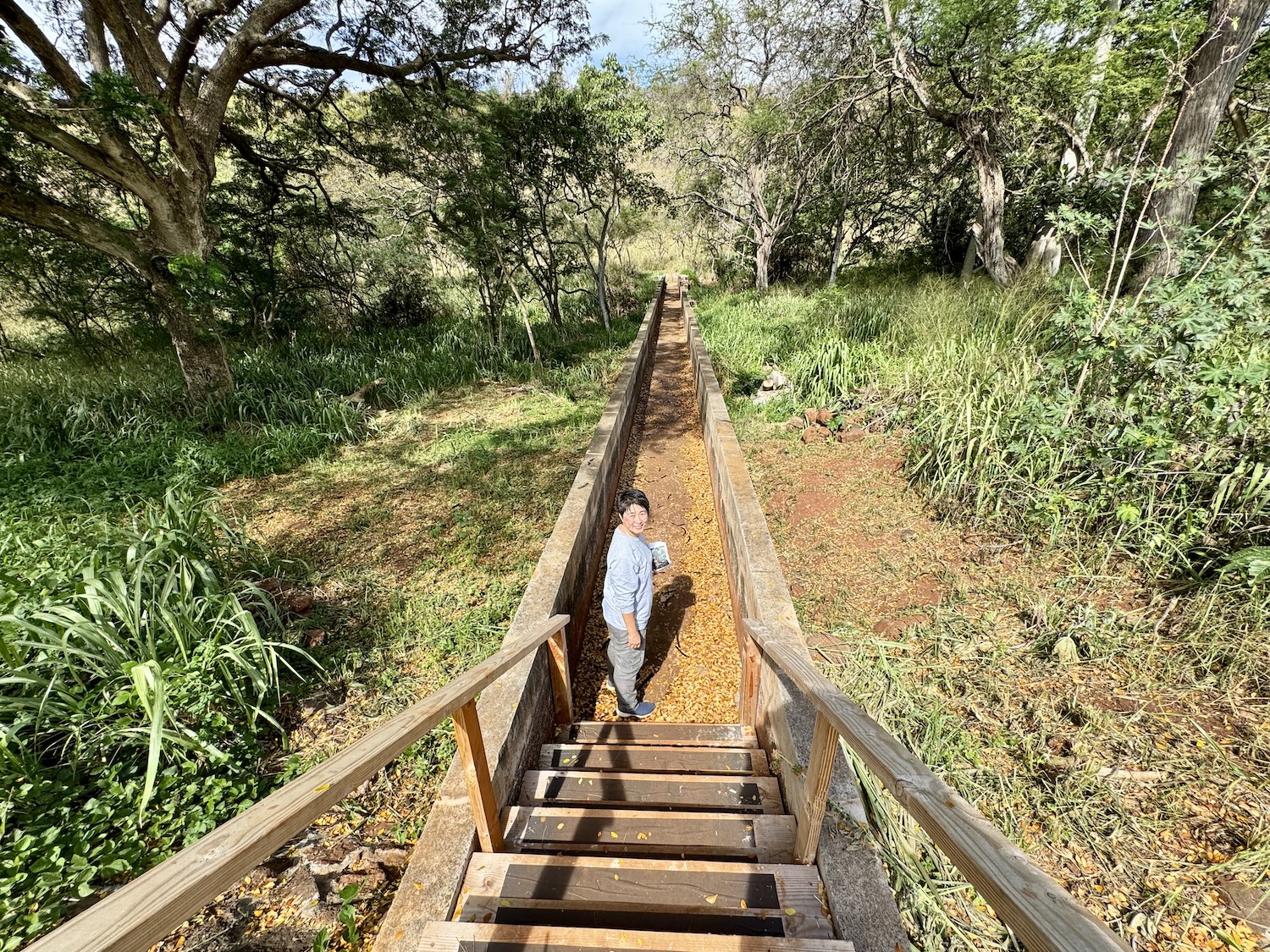 Honouliuli National Historic Site Superintendent Christine Ogura stands on an aqueduct that once divided a war-era internment camp. Honouliuli National Historic Site Superintendent Christine Ogura stands on an aqueduct that once divided a war-era internment camp.