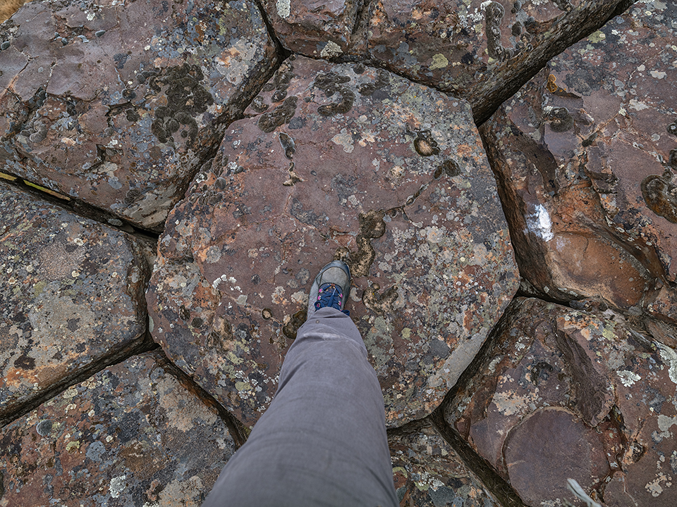 Standing atop columnar basalts, Drumheller National Natural Landmark, Ice Age Floods National Geologic Trail / Rebecca Latson Standing atop columnar basalts, Drumheller National Natural Landmark, Ice Age Floods National Geologic Trail / Rebecca Latson