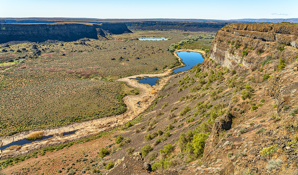 Looking southwest toward Sun Lakes-Dry Falls State Park, Ice Age Floods National Geologic Trail / Rebecca Latson Looking southwest toward Sun Lakes-Dry Falls State Park, Ice Age Floods National Geologic Trail / Rebecca Latson
