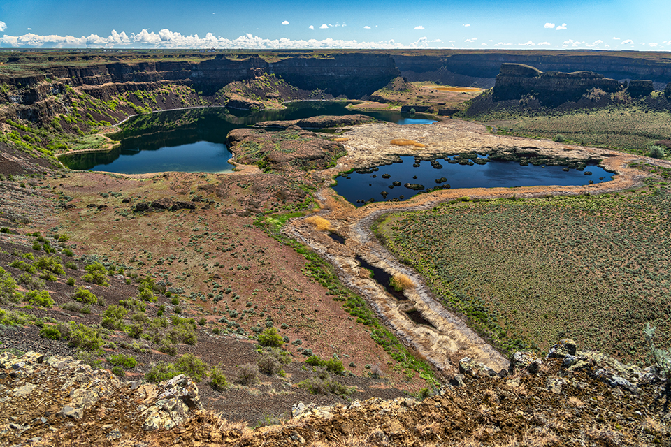 Dry Falls, a part of Grand Coulee National Natural Landmark along the Ice Age Floods National Geologic Trail / Rebecca Latson