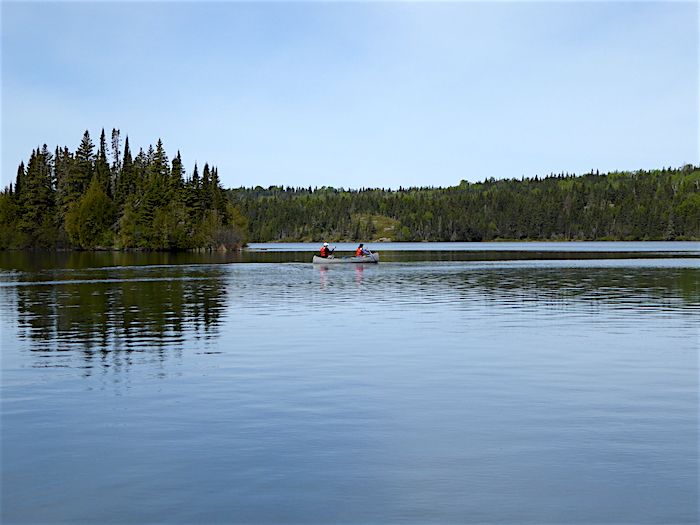 Canoeing across Tobin Bay at Isle Royale National Park/David and Kay Scott Canoeing across Tobin Bay at Isle Royale National Park/David and Kay Scott