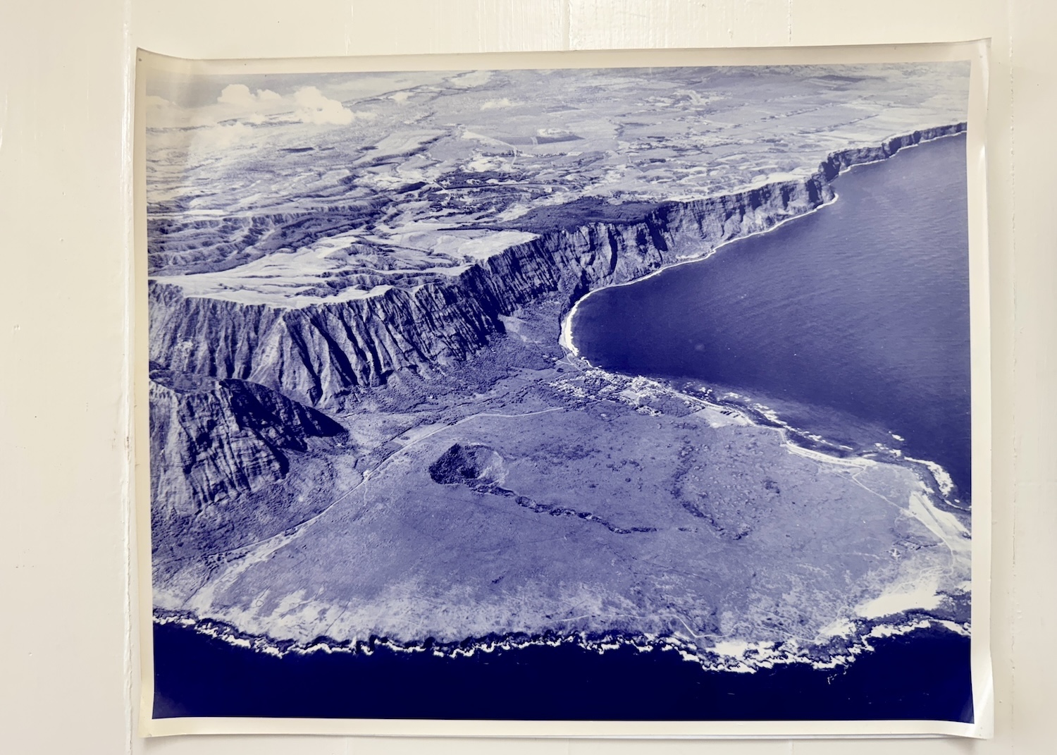A vintage aerial view of the Kalaupapa Peninsula shows how isolated it is from the rest of Molokaʻi.