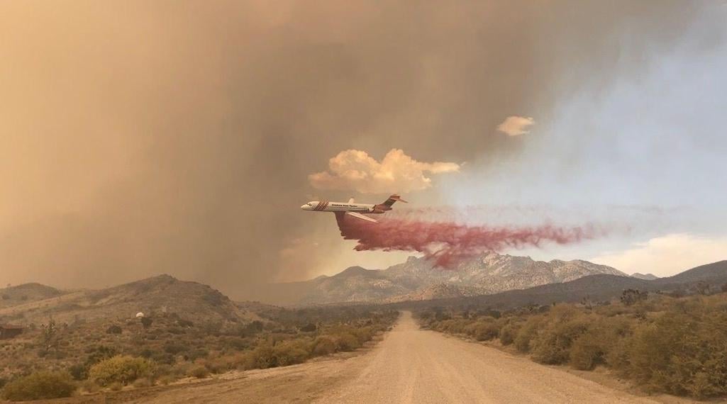 Retardent drops, like this one being made on the north end of the fire, were helping ground crews fighting the fire/Inciweb Retardent drops, like this one being made on the north end of the fire, were helping ground crews fighting the fire/Inciweb