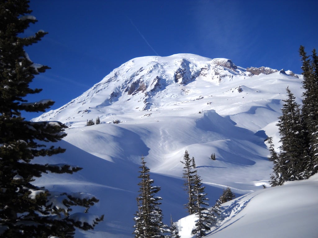 With its reputation for snowy winters, is it surprising that Mount Rainier National Park hosted the first U.S. National Downhill and Slalom Championships, in 1935?/Gary Vogt With its reputation for snowy winters, is it surprising that Mount Rainier National Park hosted the first U.S. National Downhill and Slalom Championships, in 1935?/Gary Vogt