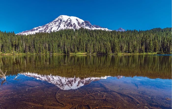 With Mount Rainier’s profile staring back up at the actual mountain, it’s easy to see how Reflection Lake got its name / Rebecca Latson With Mount Rainier’s profile staring back up at the actual mountain, it’s easy to see how Reflection Lake got its name / Rebecca Latson