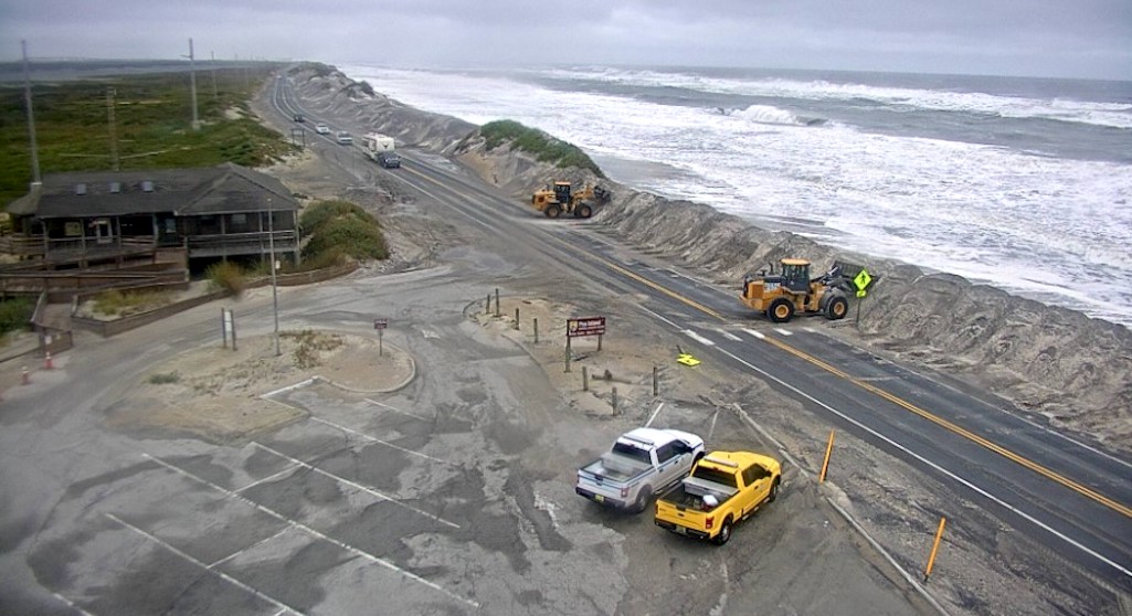 A relatively thin wall of sand keeps the Atlantic Ocean off North Carolina 12 on the Outer Banks of North Carolina/NCDOT