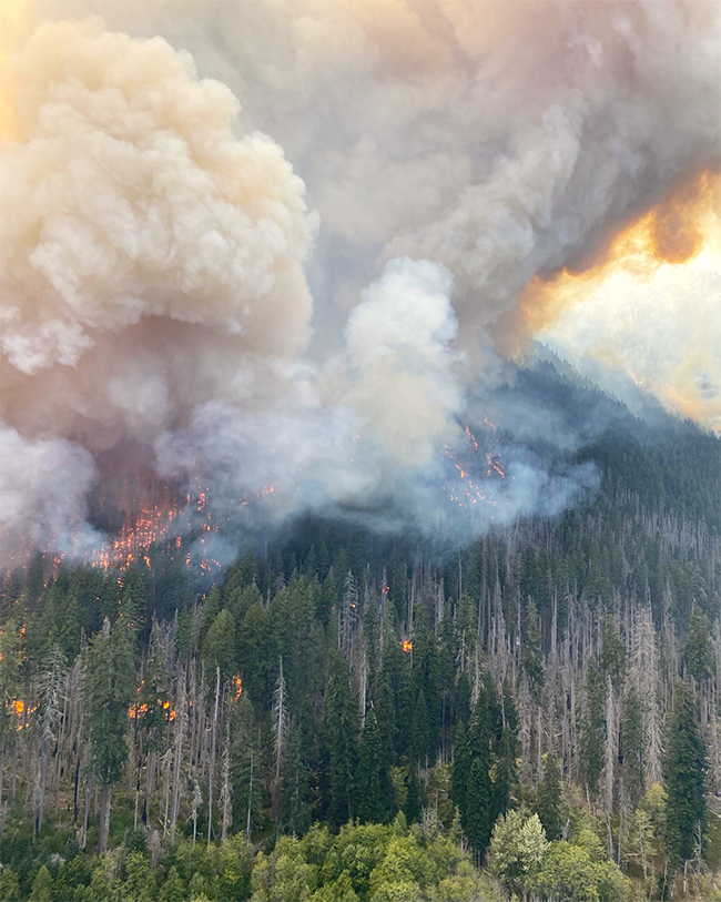 Interagency fire crews are working to prevent wildfires caused by lightning strikes from growing into anything larger, like the 2023 Debarre Fire pictured here, Olympic National Park / NPS file